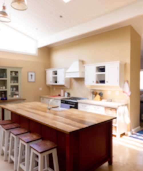 stools-arranged-by-wooden-kitchen-island-and-cabin-2026-01-09-10-03-49-utc_11zon